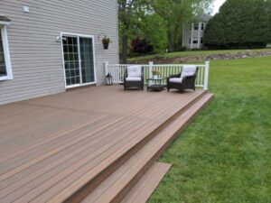 Deck builder created this gorgeous composite deck for our client. Deck building services provided in Randolph, Rockaway, Denville, Morris Plains, Morristown, Parsippany, Mount Olive, and Sparta